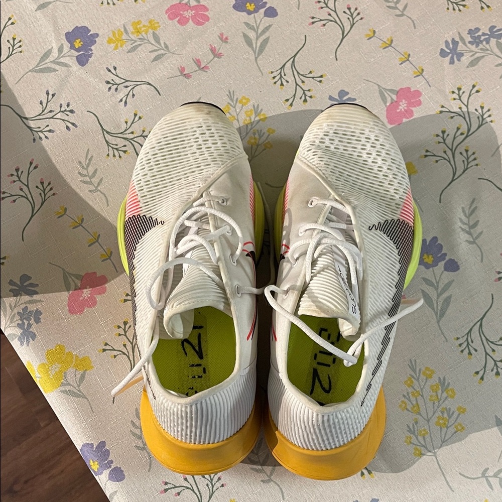 Nike White Athletic Shoes with Yellow and Pink Accents